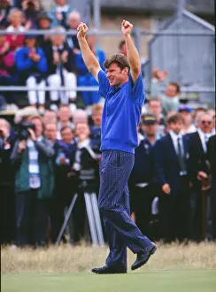 Nick Faldo raises his arms after winning the 1992 Open Championship