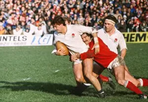 Images Dated 22nd October 2011: Nick Jeavons is tackled by Jeff Squire during the 1983 Five Nations