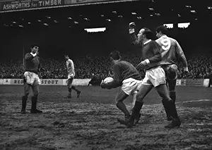 Nobby Stiles shakes a fist during the 1966 / 7 Manchester derby at Maine Road