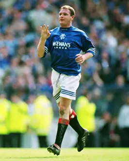 Paul Gascoigne celebrates scoring a hat-trick for Rangers in 1996
