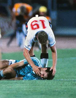 Paul Gascoigne check on Thomas Berthold before being booked in the semi-final of the 1990 World Cup