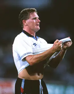 Images Dated 2011 March: Paul Gascoigne kisses his shirt in celebration after victory over Cameroon at Italia 90