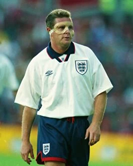Images Dated 12th March 2011: Paul Gascoigne plays with a protective face mask in 1993