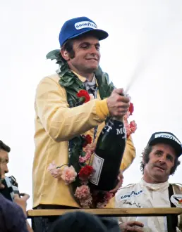 Peter Revson celebrates after winning the 1973 British Grand Prix