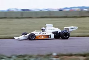 Motorsport Collection: Peter Revson on the way to victory at the 1973 British Grand Prix