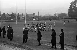 Policemen line the pitch during the South African Barbarians game against Devon in 1979