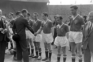 Images Dated 14th January 2009: Prince Philip is introduced to the Manchester United players before the 1958 FA Cup Final