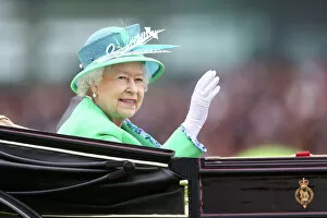 Images Dated 23rd June 2012: The Queen waves to the crowd at Royal Ascot