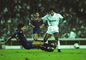 Real Madrids Hugo Sanchez is tackled by Barcelonas Josep Moratalla