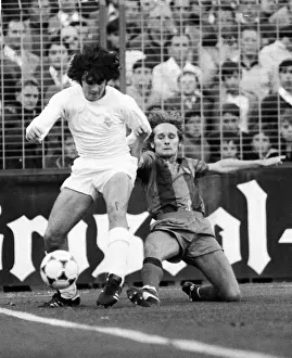 Real Madrid Prints: Real Madrids Jose Antonio Camacho is challenged by Barcelonas Allan Simonsen