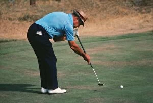 Golf Collection: Sam Snead demonstrating his split-grip, side-saddle putting technique