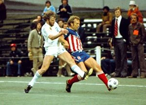 Images Dated 22nd March 2012: San Antonios Bobby Moore wins the ball from Portlands Ray Martin - 1976 NASL