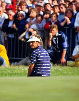 Images Dated 7th July 2011: Sandy Lyle falls to his knees after leaving his chip short on the final hole of the 1985 Open