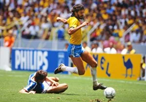 Images Dated 5th December 2011: Scorates evades a tackle at the 1986 World Cup