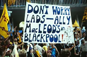 Scotland fans at the 1982 World Cup hold up a banner for ex-manager Ally MacLeod