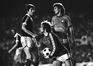 Scotland goalkeeper Alan Rough gather the ball frokm Brazils Zico in 1977