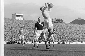 Images Dated 1st February 2005: Scotland keeper Tommy Younger catches a high ball with George Young looking on in 1956