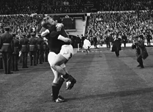 Images Dated 9th August 2013: Scotlands Davie Wilson hugs a teammate after victory at Wembley - 1962 / 3 British Home Championship