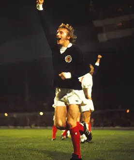 Scotlands Denis Law celebrates qualification for the 1974 World Cup