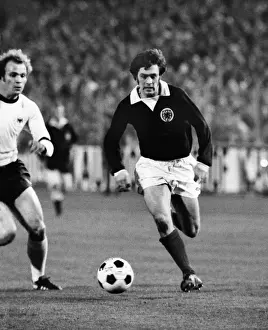 Scotlands Erich Schaedler and West Germanys Uli Hoeness