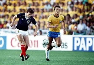 Scotlands John Robertson and Brazils Leandro at the 1982 World Cup
