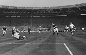 Images Dated 9th August 2013: Scotlands John White sees his shot saved from England goalkeeper Gordon Banks - 1962 / 3 British