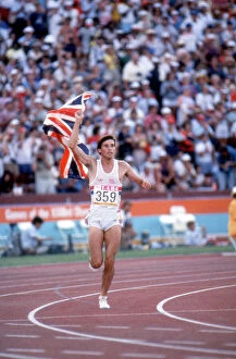 1984 Los Angeles Olympics Collection: Seb Coe goes on a victory lap after retaining his 1500m Olympic title in Los Angeles in 1984