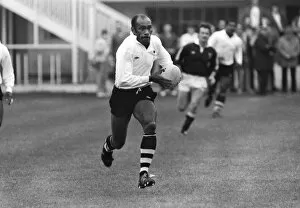 Images Dated 19th November 2010: Senivalati Laulau runs with the ball for Fiji in 1985