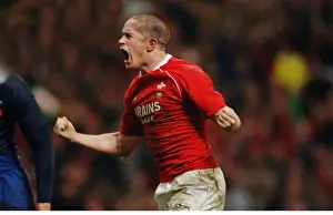 Shane Williams celebrates scoring against France in the 2008 Six Nations