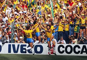 Socrates celebrates with his teammates after scoring for Brazil at the 1982 World Cup