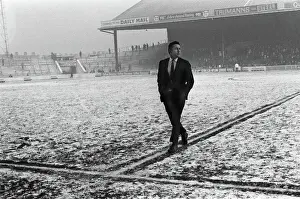 Spurs Prints: Spurs captain Dave Mackay inspects a snowy Maine Road