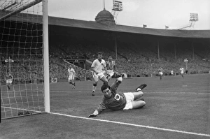 Stand-in goalkeeper Jackie Blanchflower makes a save during the 1957 FA Cup Final