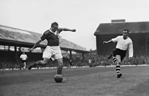 Stanley Matthews crosses the ball for Blackpool against Luton Town in 1957