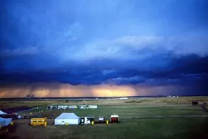 Images Dated 6th July 2011: The sun bursts through the storm clouds at the 1985 Open Championship