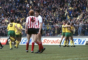 Sunderlands Gordon Chisholm stands dejected after his own goal as Norwich celebrate - 1985 League Cup Final