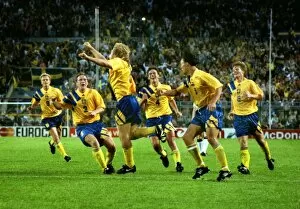 Images Dated 24th May 2012: Swedens Tomas Brolin celebrates with his teammates after scoring the winning goal against England