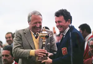 Ted Heath presents USA captain Jack Burke with the Ryder Cup in 1973