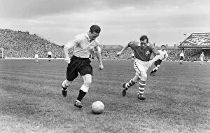 Images Dated 21st March 2012: Tom Finney on the ball for the English League at Blackpool in 1950