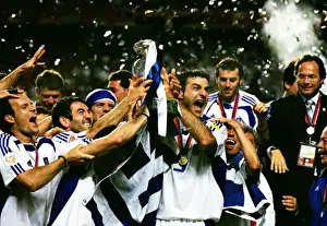 Traianos Dellas and the Greece team celebrate winning Euro 2004 Final