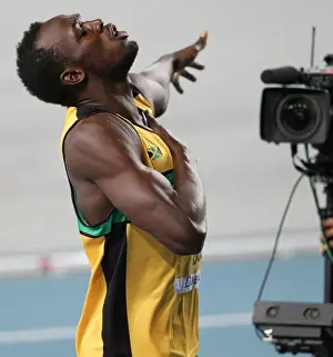 Sport Prints: Usain Bolt plays to the cameras after winning 200m Gold at the 2011 World Championships