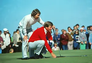 The USAs Lanny Watkins and Ed Sneed line up a putt at the 1977 Ryder Cup