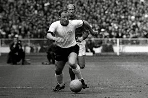 Images Dated 14th December 2011: Uwe Seeler of West Germany on the ball during the 1966 World Cup final +