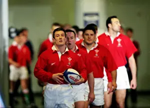 Rugby Prints: Wales captain Rob Howley leads his side out against France - 1999 Five Nations
