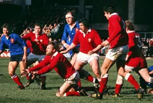 Images Dated 21st October 2011: Wales Derek Quinnell passes the ball out against France - 1978 Five Nations