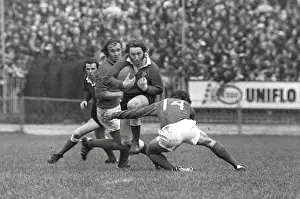 Wales JPR Williams runs at Frances Roland Bertranne - 1974 Five Nations