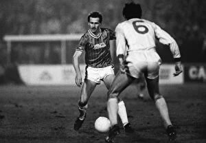 Images Dated 8th March 2012: Walsalls Richard O Kelly runs at Liverpools Alan Hansen during the 1983 / 4 League Cup semi-final