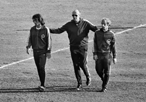 Background Prints: West German manager Helmut Schoen walks with Berti Vogts and Wolfgang Overath - 1974 World Cup
