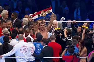 + Wladimir Klitschko celebrates after defeating David Haye