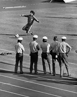 Background Prints: Wolfgang Overath is watched by West German police - 1974 World Cup