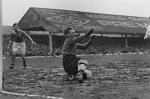 Wolves keeper Bert Williams dives in the Portman Road mud in 1949 / 50